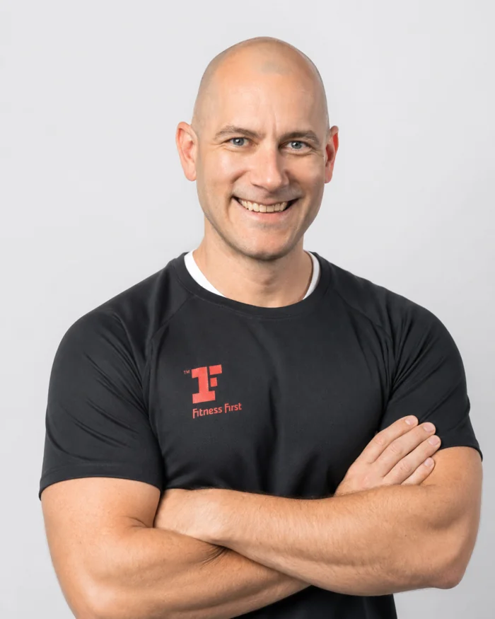 Matthew Carney in his black Fitness First coaching shirt
