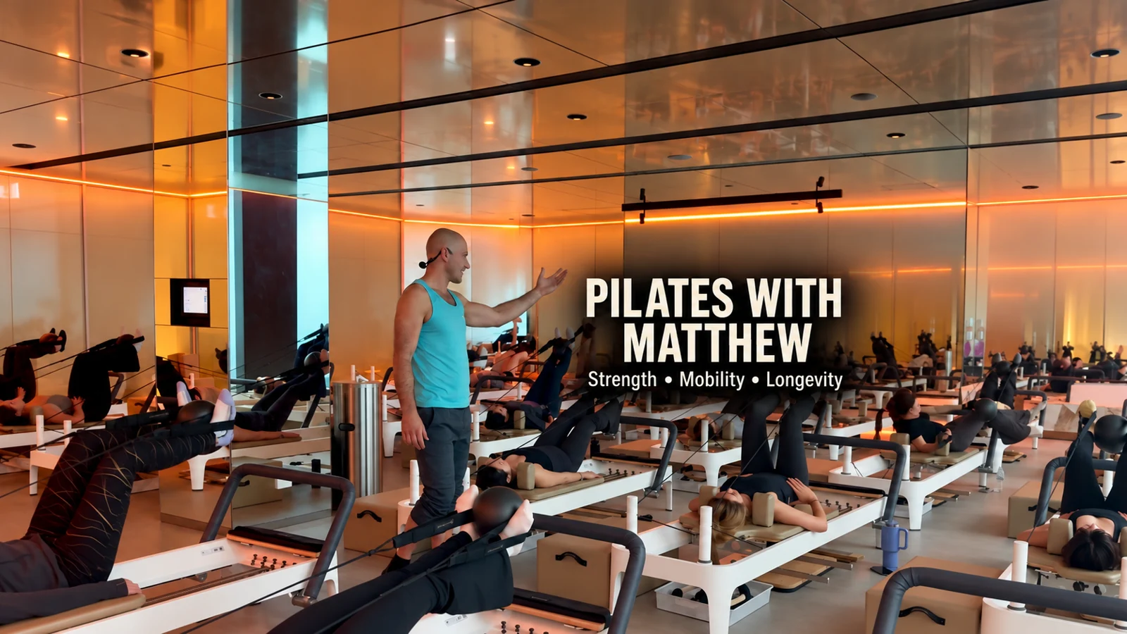 Pilates with Matthew — Matthew teaching in a reformer studio